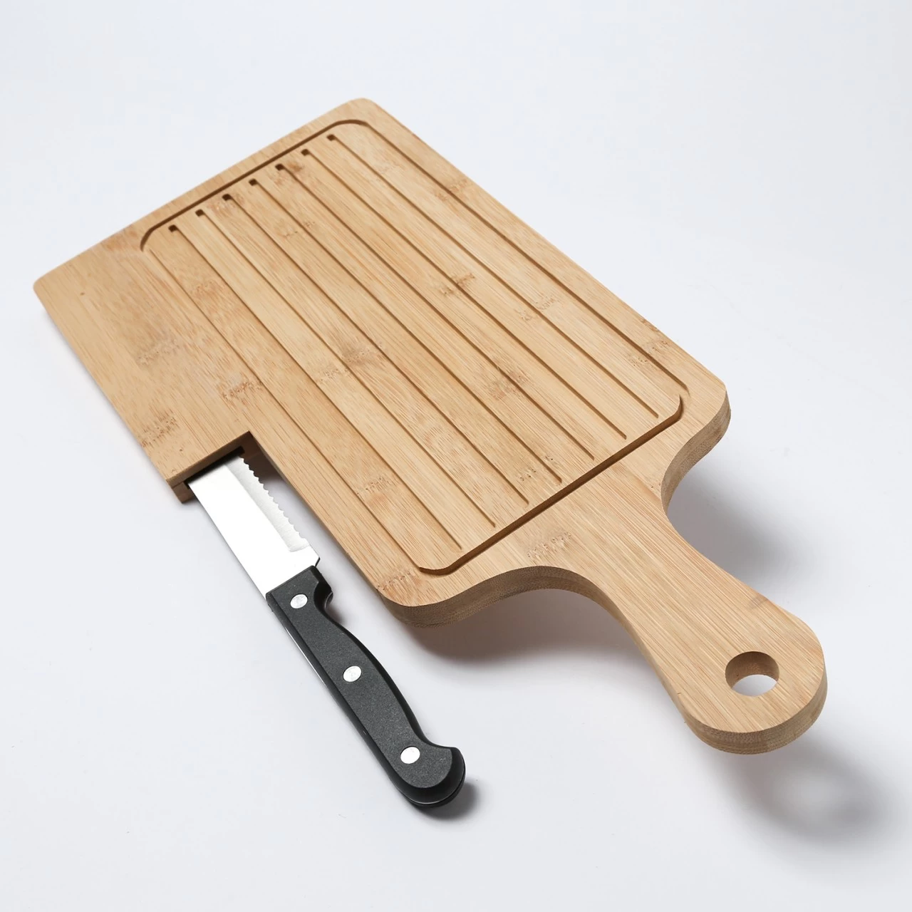 Brotschneidebrett Mit Brotmesser - Krümelrillen - Bambus - 19x45x1,5cm 2 Brotschneidebrett Mit Brotmesser - Krümelrillen - Bambus - 19x45x1,5cm – Bild 2